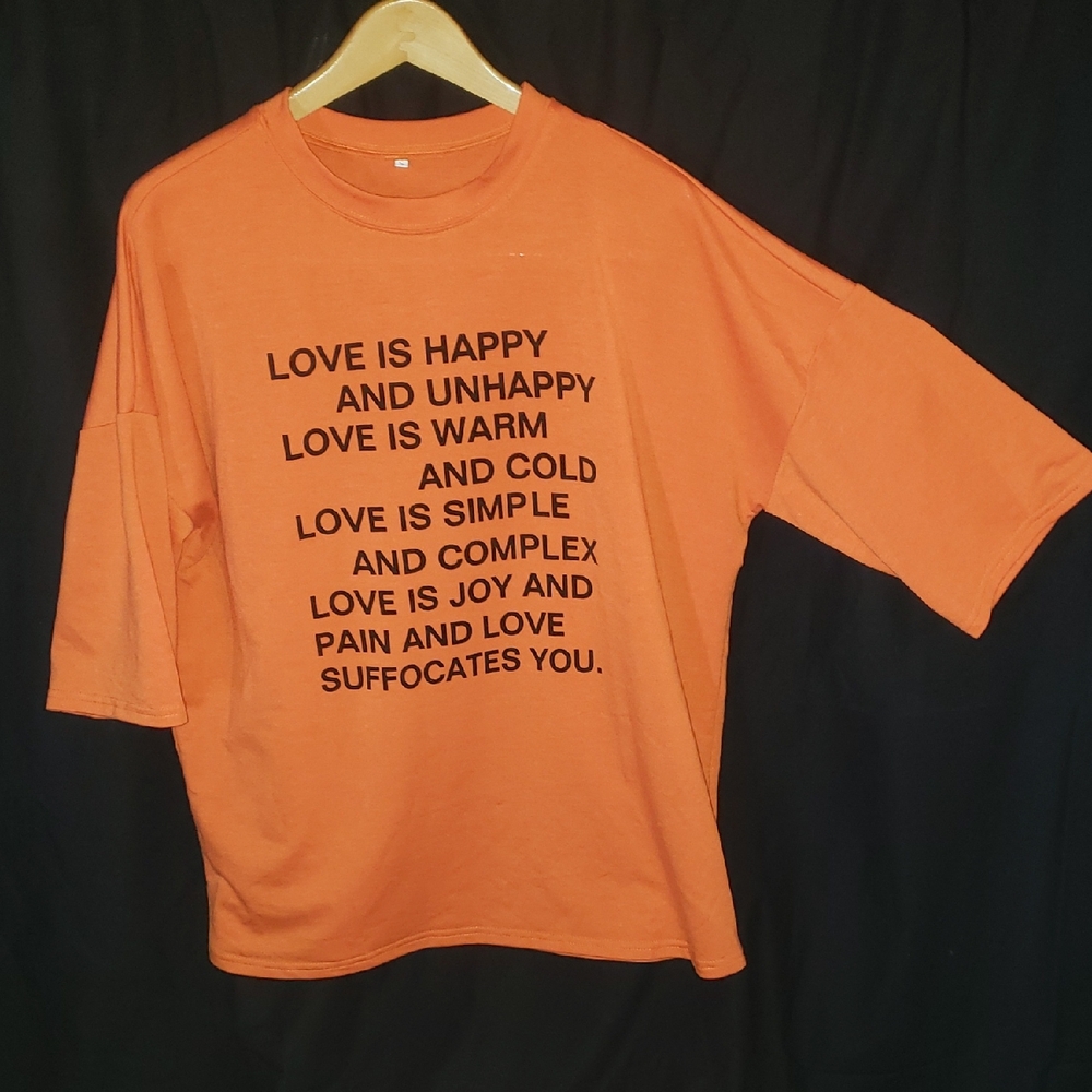 Graphic Orange T-Shirt with Black Text